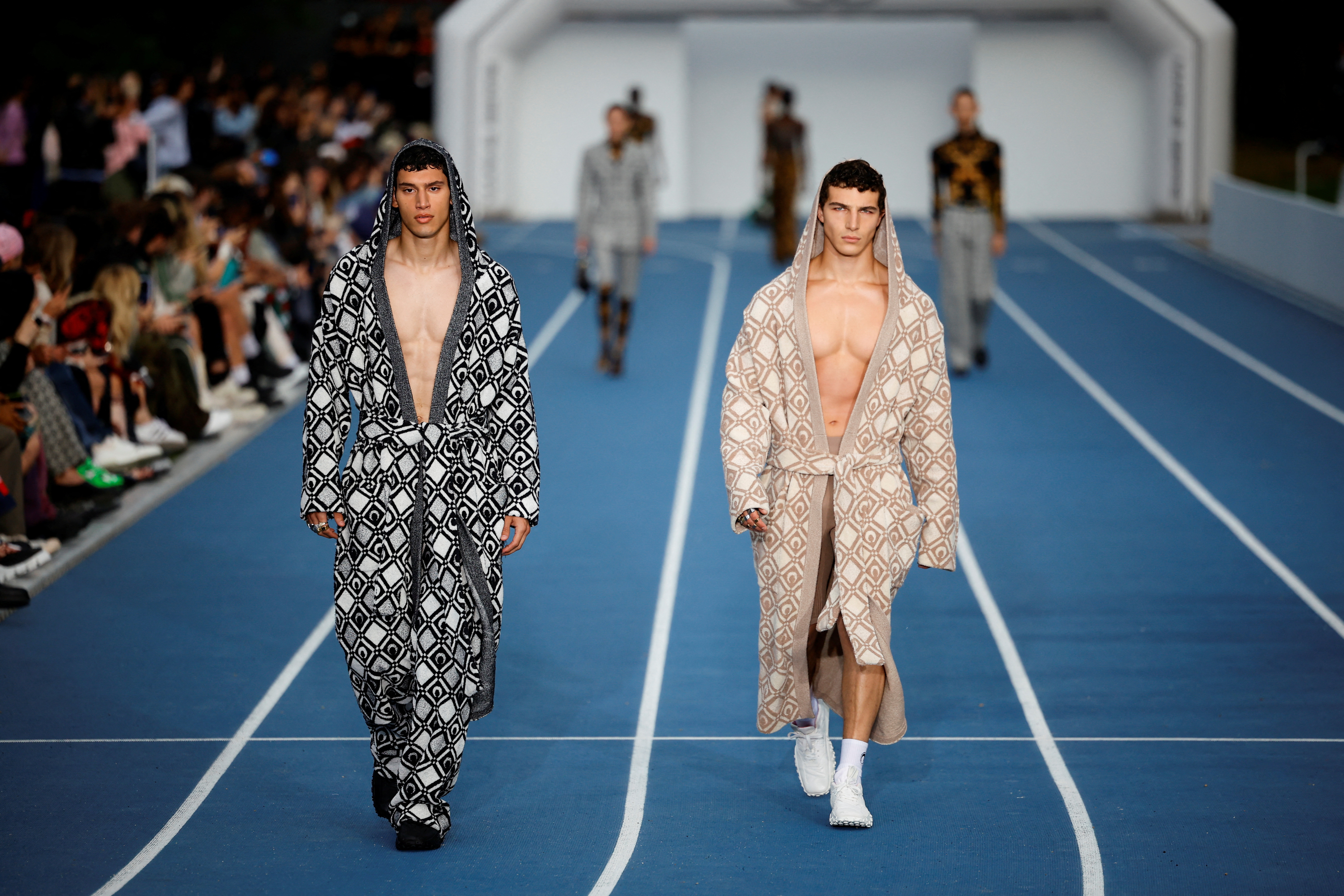 In this image released on June 15th, models walk the runway during