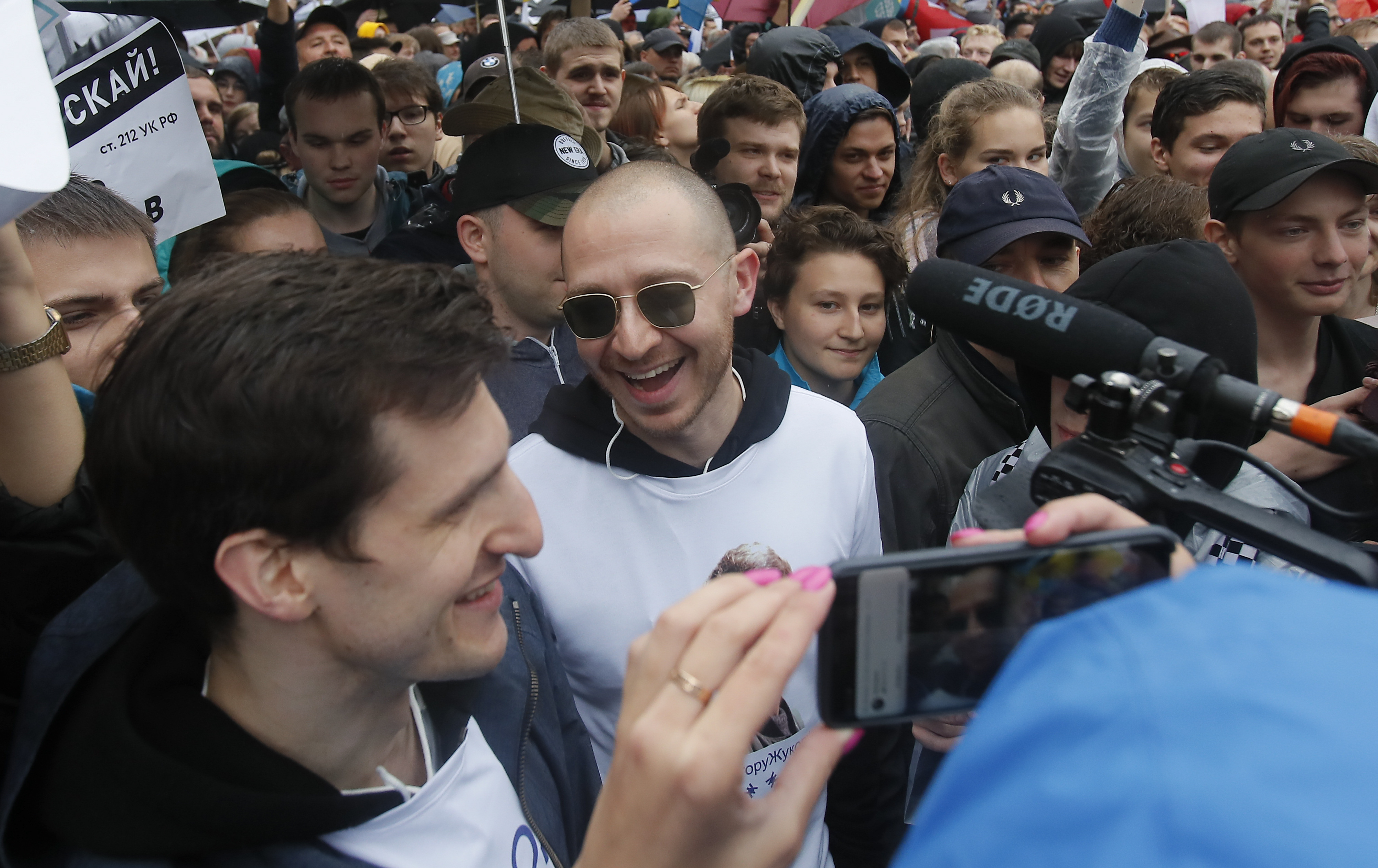 Russian rapper Oxxxymiron attends a rally to demand authorities allow opposition candidates to run in a local election in Moscow