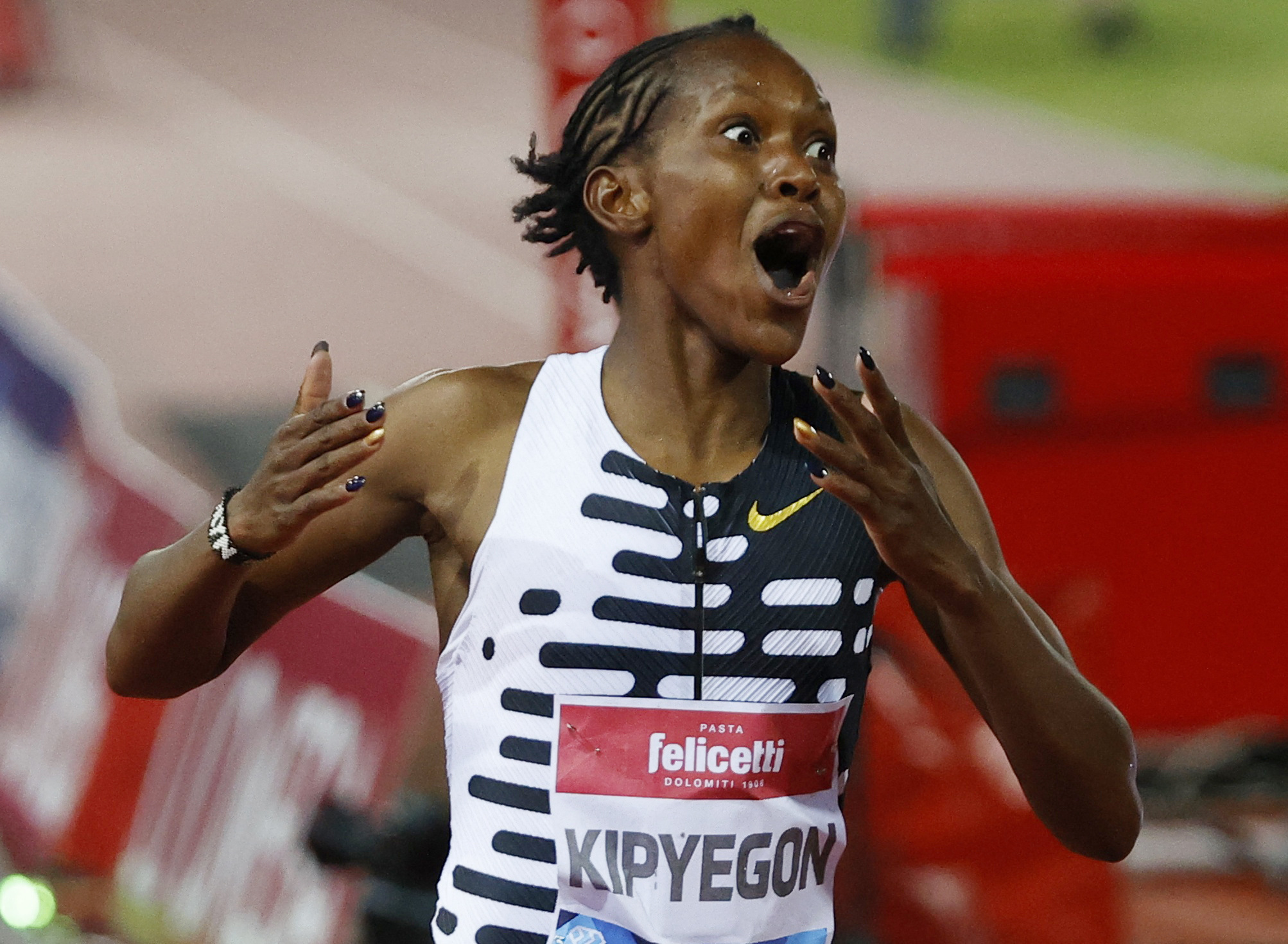 Shocked Kipyegon Adds 5,000m World Record To 1500m Mark In Paris | Reuters