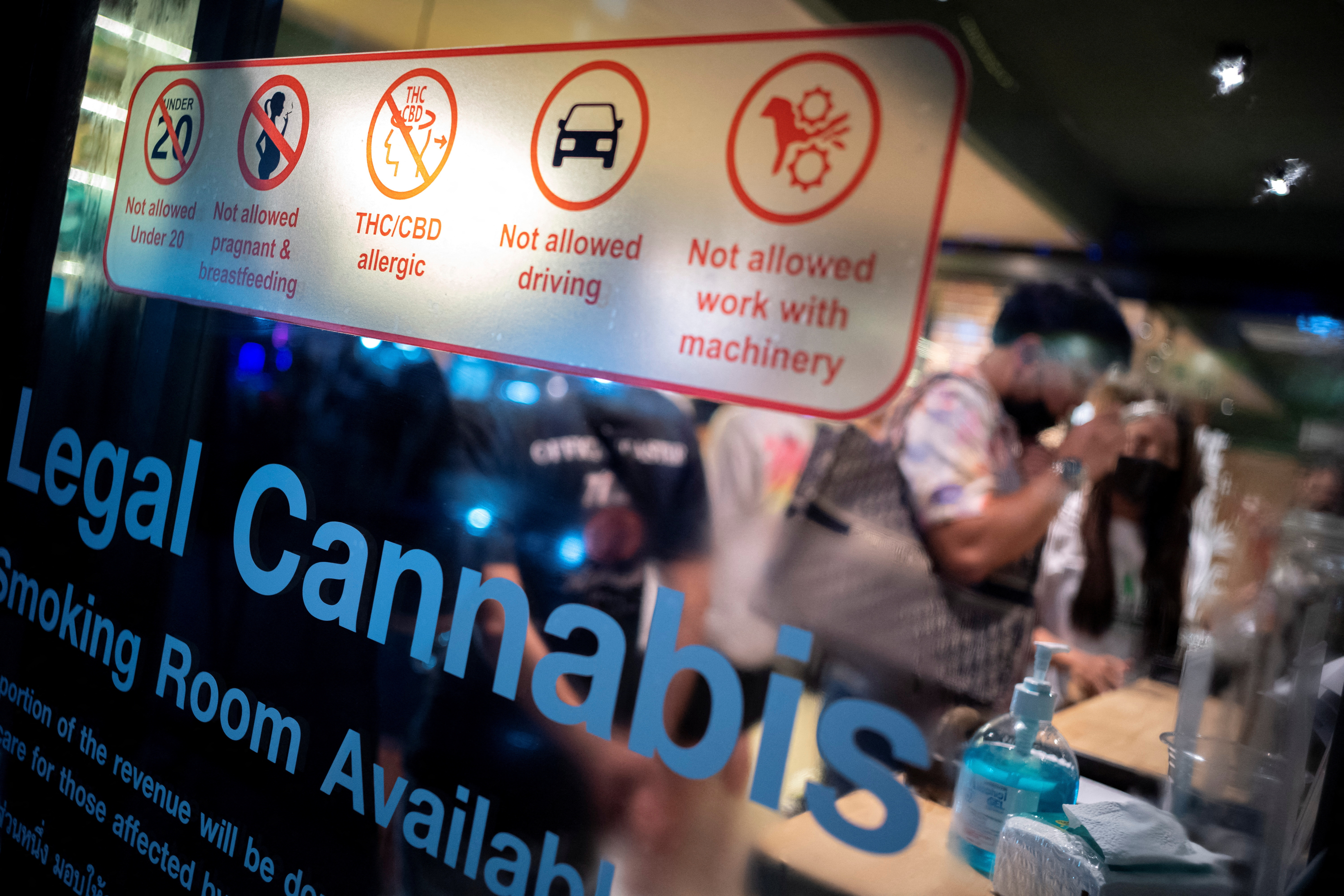 Signage is seen in front of the RG420 cannabis store, at Khaosan Road, one of the favourite tourist spots in Bangkok