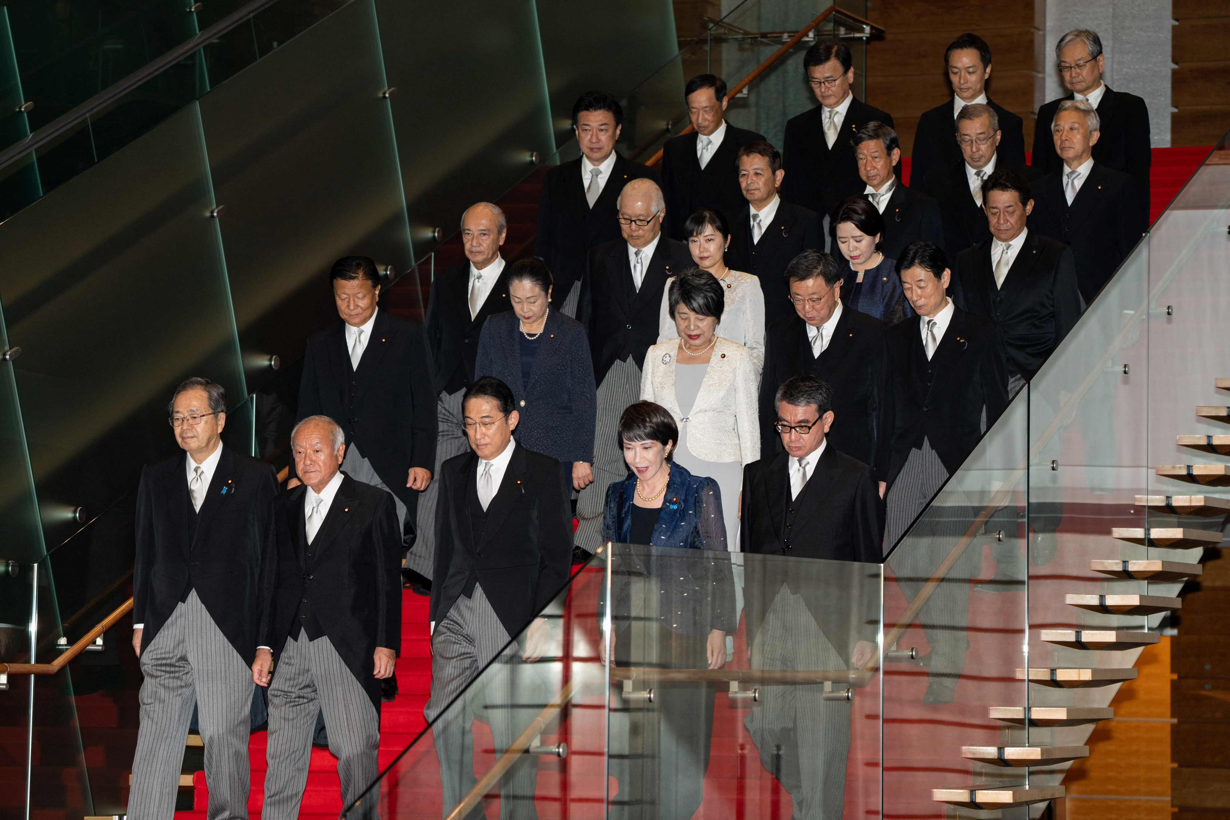 Japan's new cabinet reflects PM's focus on gender and defence