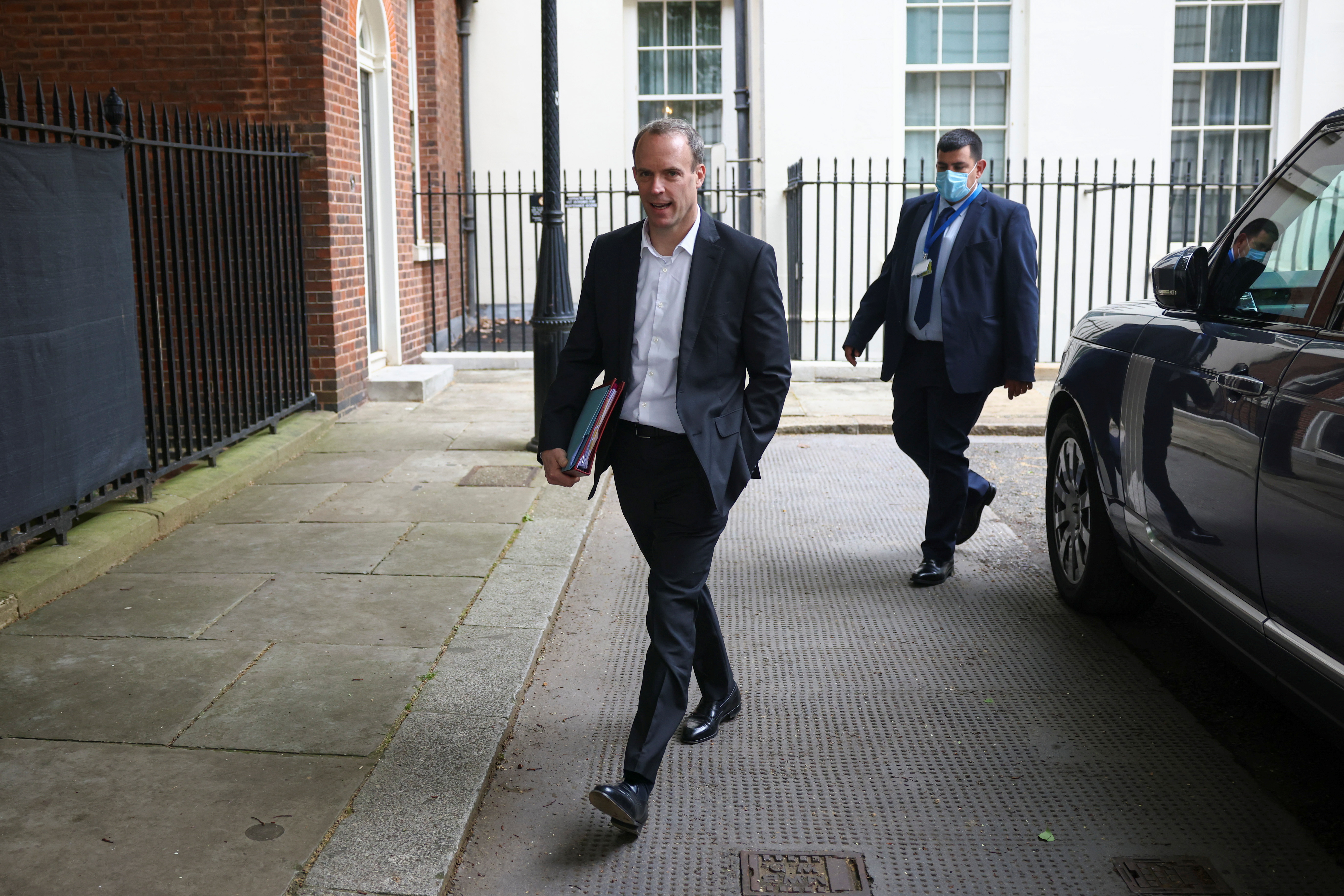 Britain's Foreign Secretary Dominic Raab walks on Downing Street, in London, Britain May 20, 2021. REUTERS/Henry Nicholls