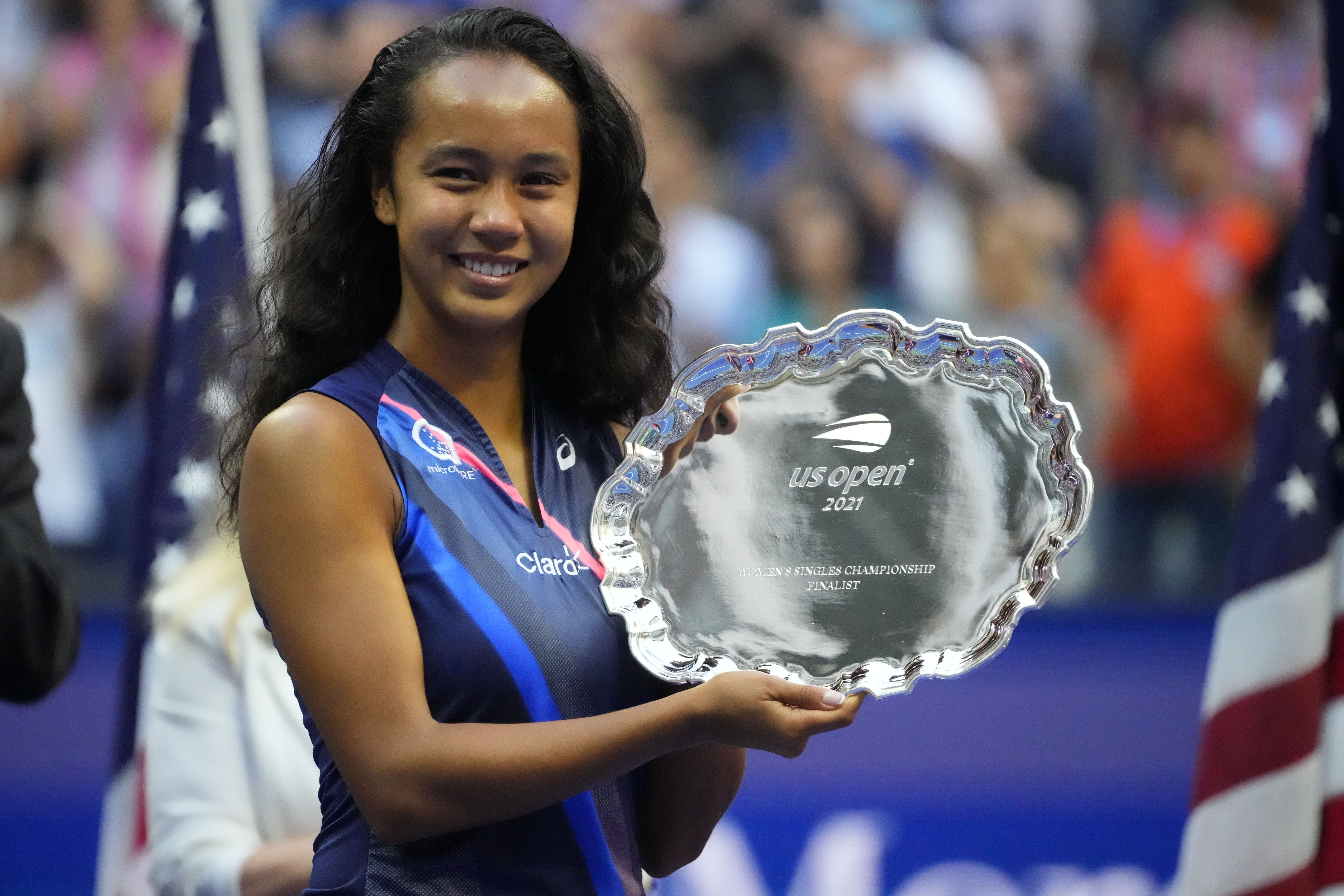 Sep 11, 2021; Flushing, NY, USA; Leylah Fernandez of Canada holds the finalist trophy after her match against Emma Raducanu of Great Britain (not pictured) in the women's singles final on day thirteen of the 2021 U.S. Open tennis tournament at USTA Billie Jean King National Tennis Center. Mandatory Credit: Robert Deutsch-USA TODAY Sports