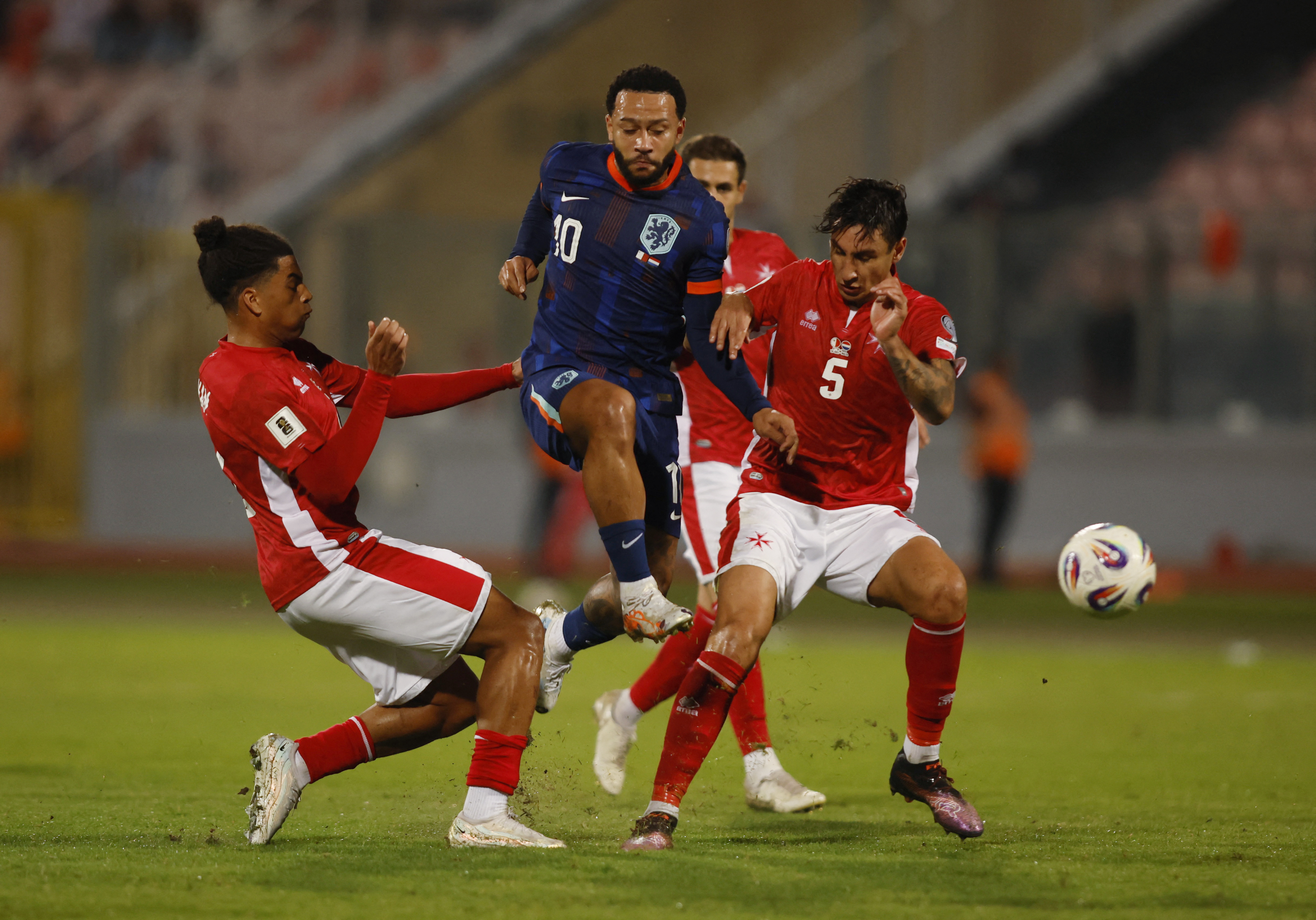 Dutch beat Malta 4-0 to open three-point lead in World Cup