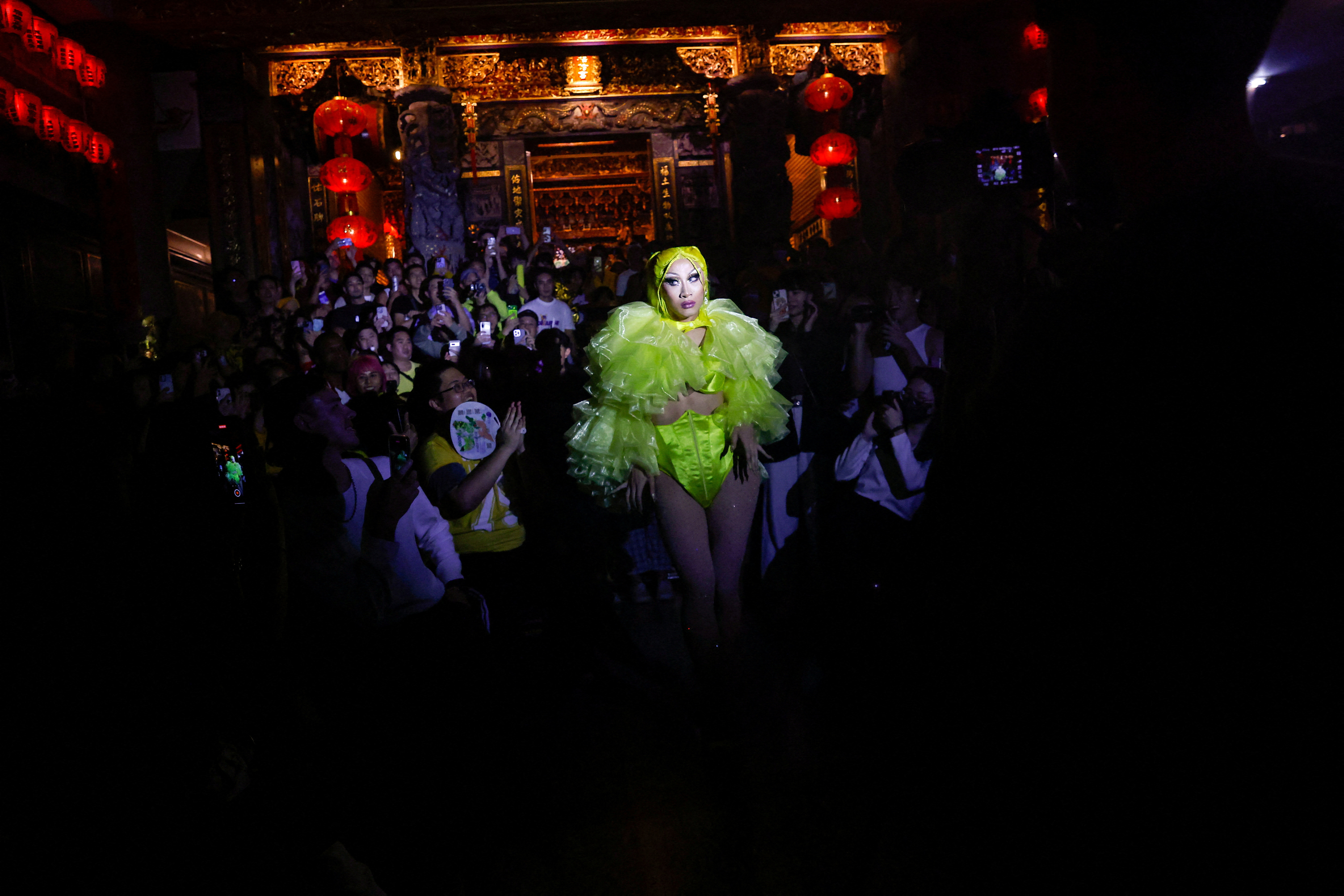 Nymphia Wind, a Taiwanese drag queen performs at a local temple ahead of the annual pride parade in Taipei